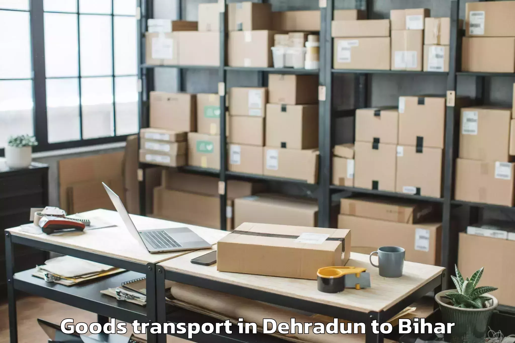 Book Your Dehradun to Karpi Goods Transport Today